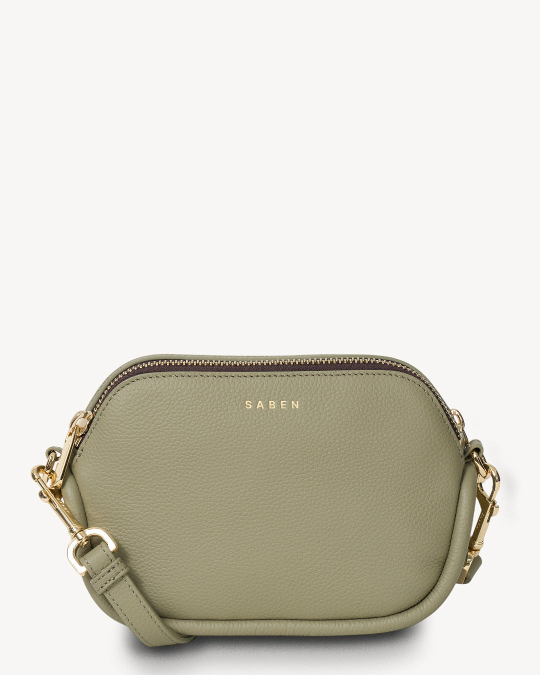Green handbag with gold accents on a white background