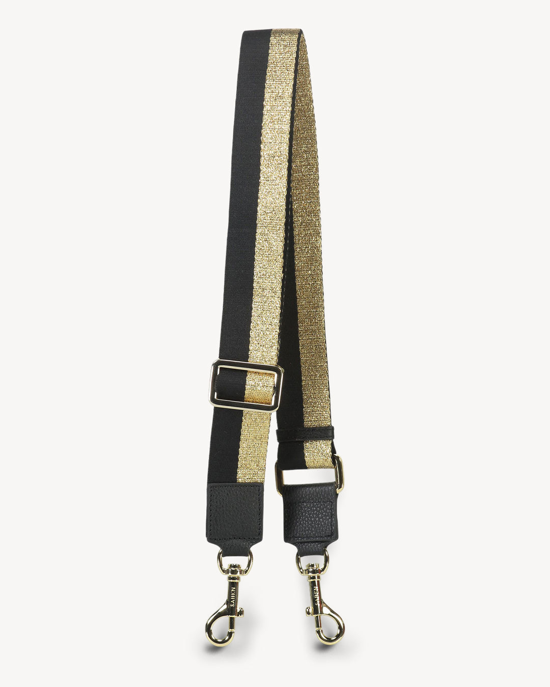 A striped feature strap with black, gold and white colors, with leather trim and gold-plated hardware, fully adjustable.
