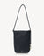 Black leather handbag with a strap on a white background
