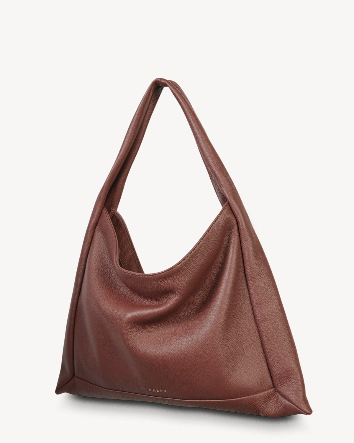 Brown leather handbag on a white background