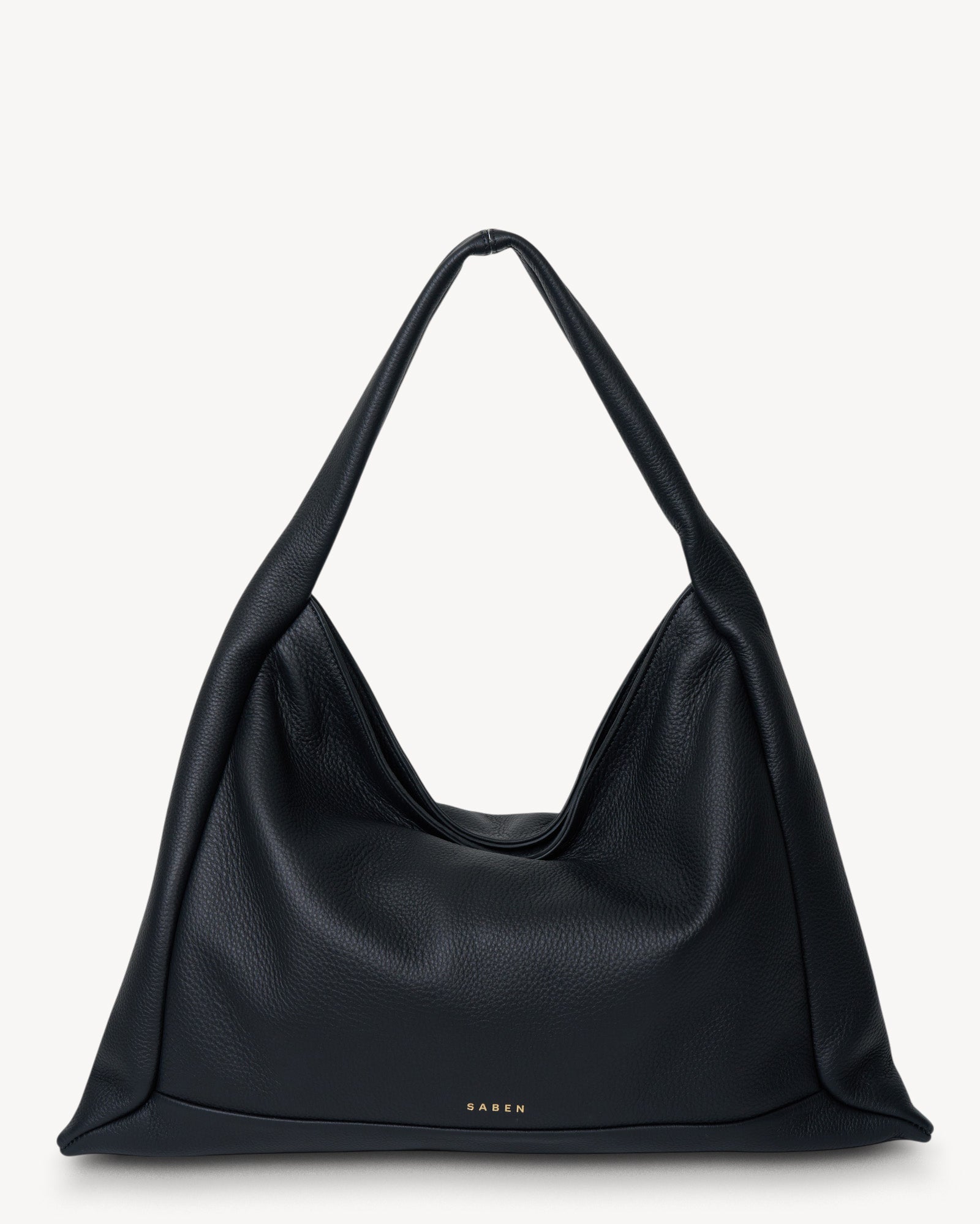 Black leather handbag on a light gray background