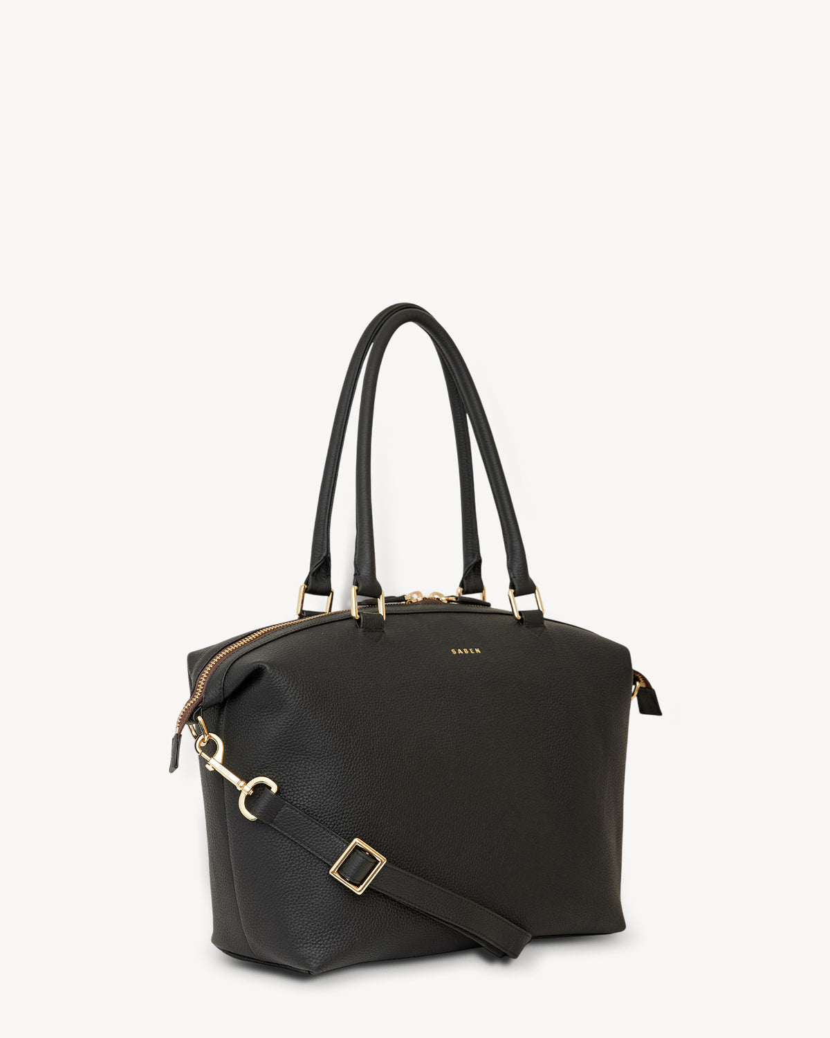 Black handbag with gold accents on a white background