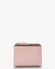 Pink wallet with gold zipper on a white background