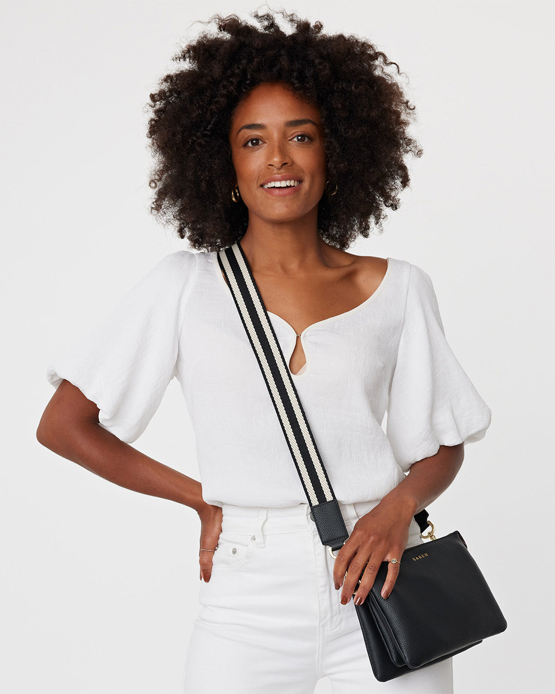 a white and black strip strap